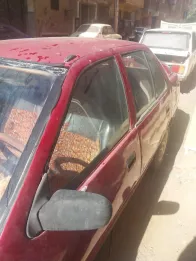 سوزوكى سويفت 1996 أبيض مستعملة للبيع