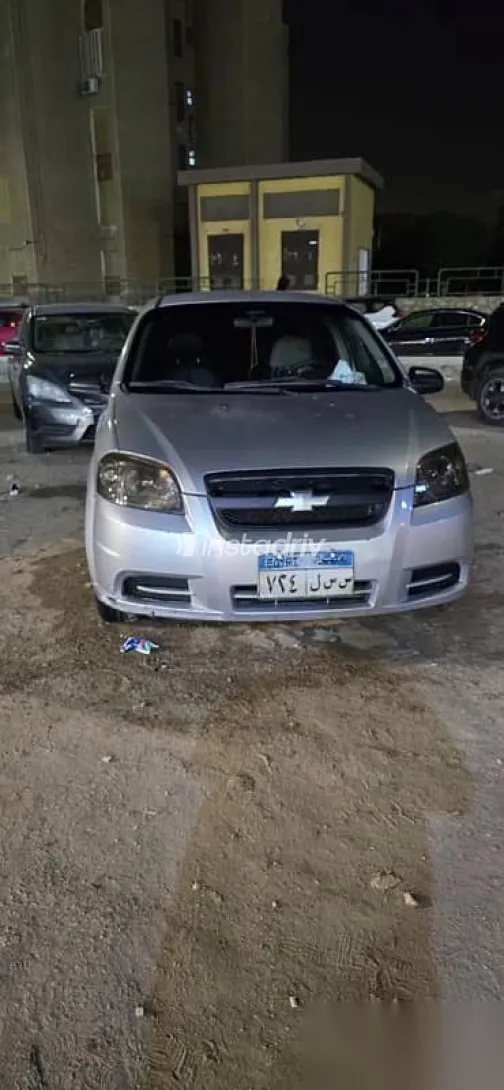 شيفروليه افيو 2013 فضي مستعملة للبيع - 1