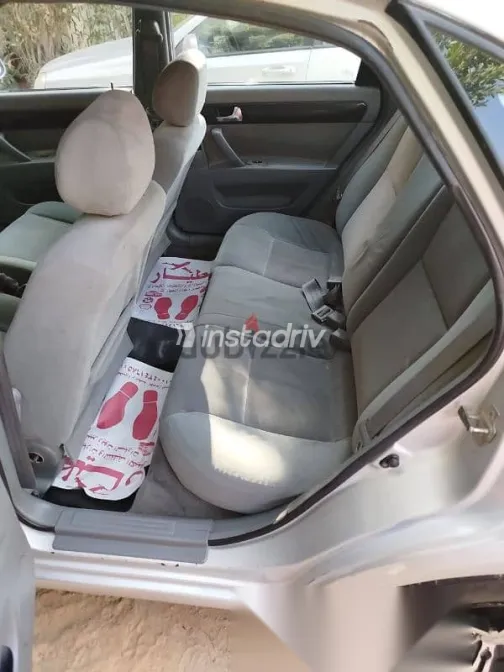 شيفروليه أوبترا 2007 فضي مستعملة للبيع - 7