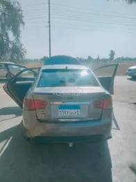 كيا سيراتو 2010 فضي مستعملة للبيع