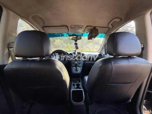 كيا كارينز 2010 أبيض مستعملة للبيع - 3