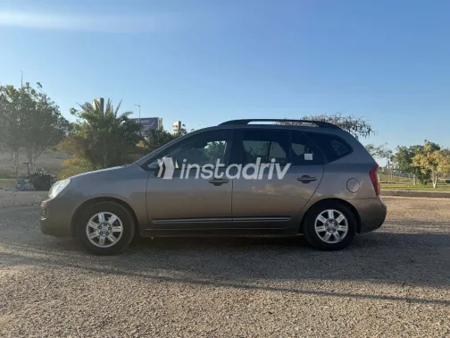 كيا كارينز 2010 أبيض مستعملة للبيع - 5