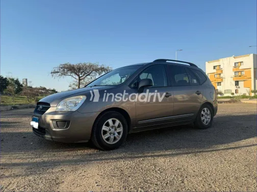 كيا كارينز 2010 أبيض مستعملة للبيع - 8