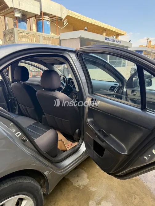 ميتسوبيشي لانسر اى اكس شارك 2015 أبيض مستعملة للبيع - 7