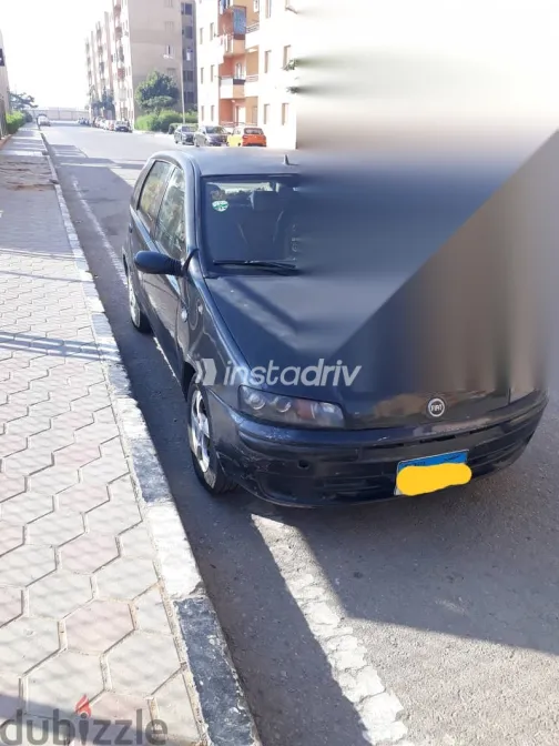 فيات بونتو 2002 رمادي مستعملة للبيع - 1