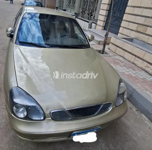 دايو نوبيرا 2 1999 ذهبي مستعملة للبيع - 1