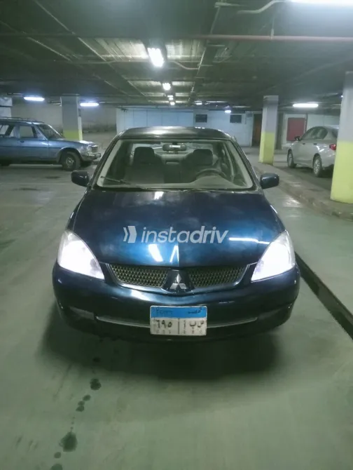 ميتسوبيشي لانسر 2009 أبيض مستعملة للبيع - 2