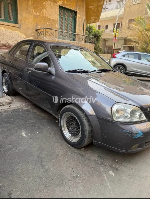 شيفروليه أوبترا 2011 أبيض مستعملة للبيع - 3