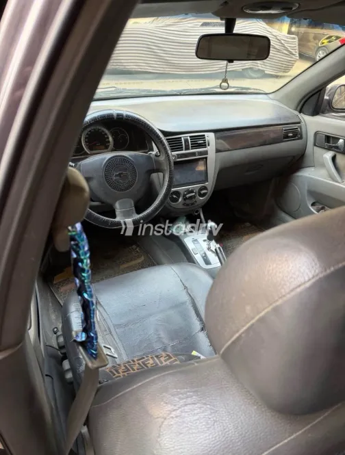 شيفروليه أوبترا 2011 أبيض مستعملة للبيع - 4