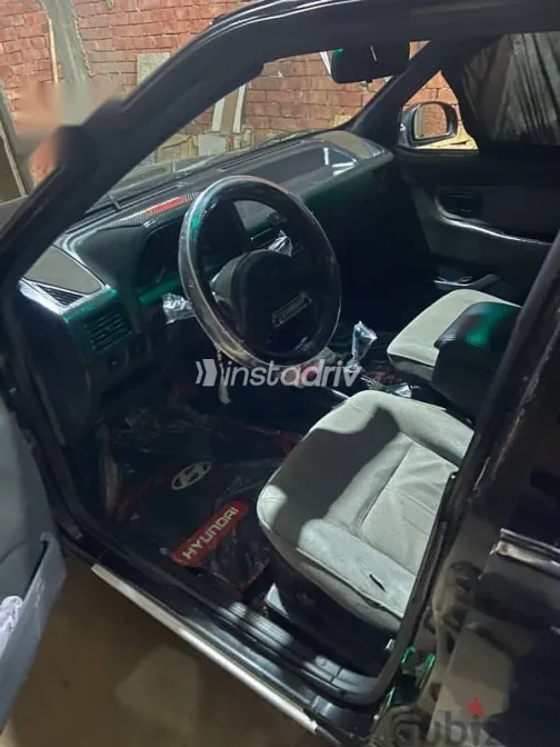 هيونداي اكسيل 1995 أسود مستعملة للبيع - 6