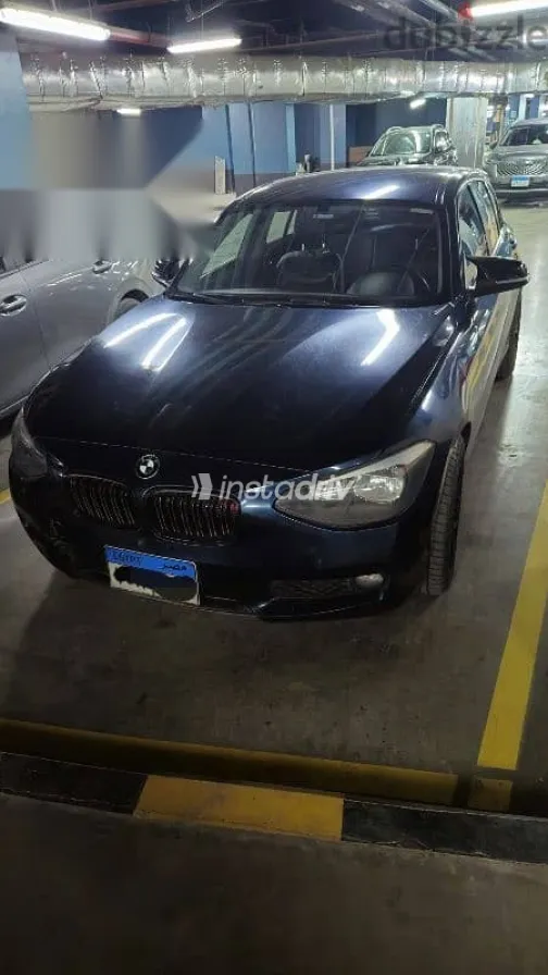 بي ام دبليو 118 2014 أزرق غامق مستعملة للبيع - 1