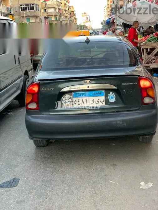 دايو لانوس 2005 رمادي مستعملة للبيع - 1
