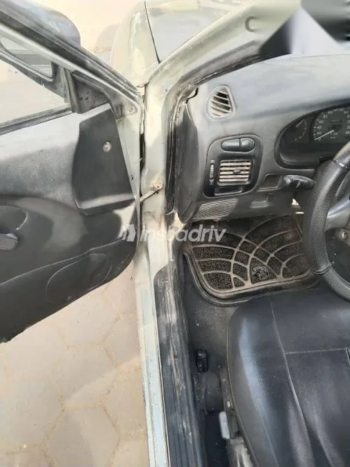 ميتسوبيشي لانسر 1994 فضي مستعملة للبيع - 5