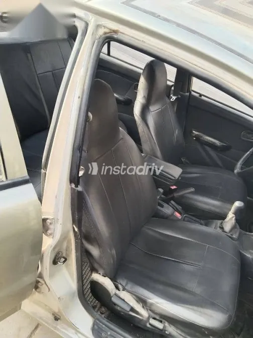 ميتسوبيشي لانسر 1994 فضي مستعملة للبيع - 6