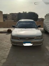 ميتسوبيشي لانسر 1994 فضي مستعملة للبيع