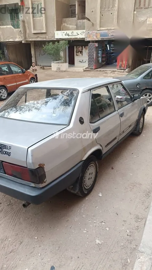 فيات شاهين 2004 فضي مستعملة للبيع - 4