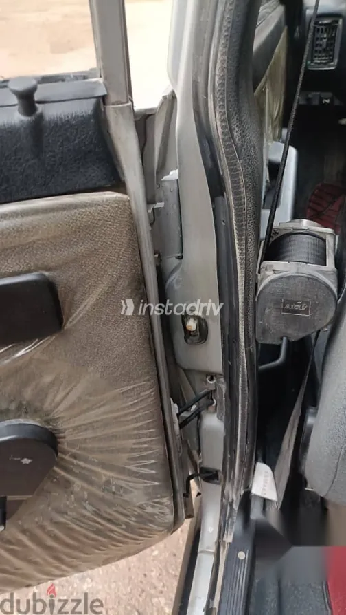 فيات شاهين 2004 فضي مستعملة للبيع - 9