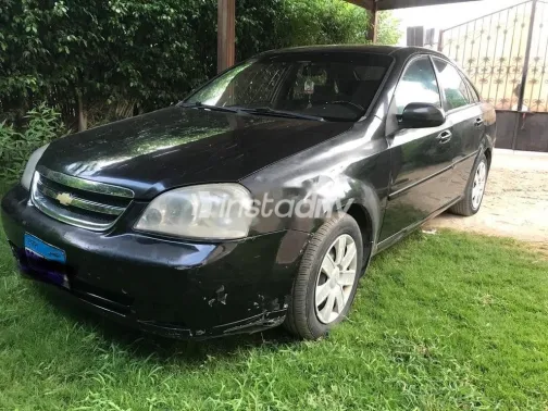 شيفروليه أوبترا 2011 أسود مستعملة للبيع - 3
