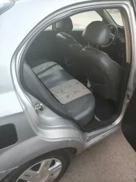 شيفروليه افيو 2009 أبيض مستعملة للبيع