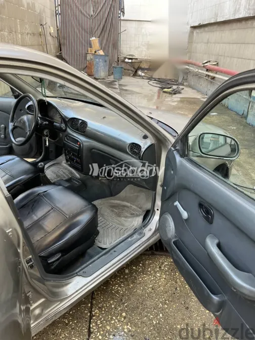 هيونداي اكسنت 2005 بني مستعملة للبيع - 10