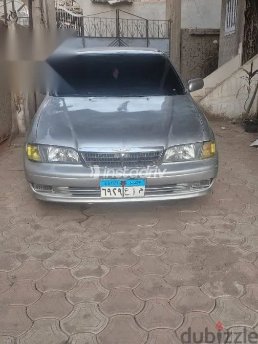 نيسان صنى 1999 فضي جديدة للبيع - 1