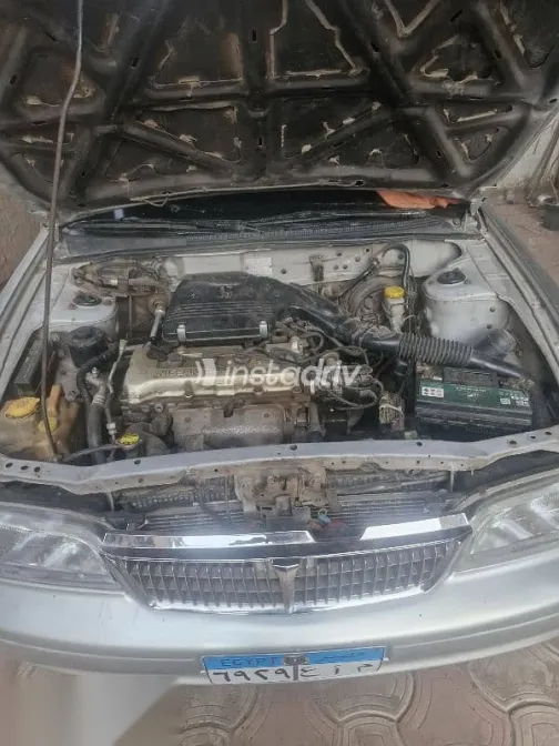 نيسان صنى 1999 فضي جديدة للبيع - 2