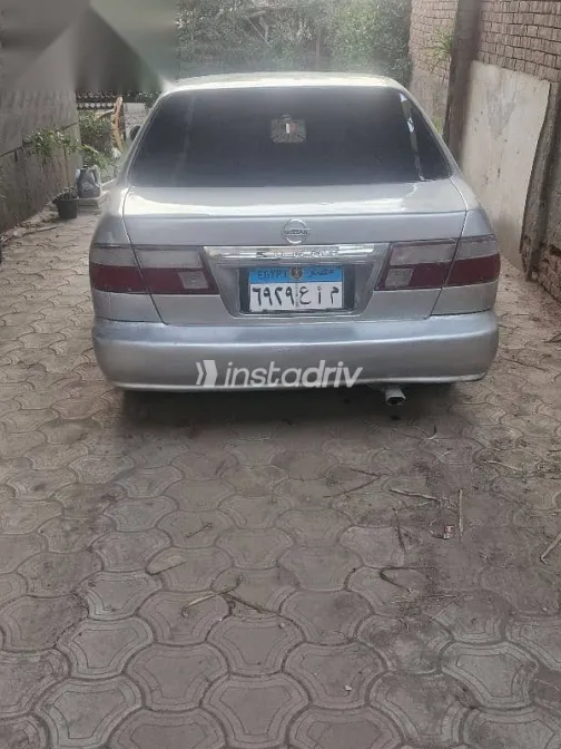 نيسان صنى 1999 فضي جديدة للبيع - 4