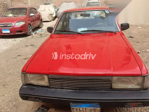 دايهاتسو شارمـنت 2014 أحمر مستعملة للبيع - 1