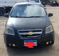 شيفروليه افيو 2013 أسود مستعملة للبيع