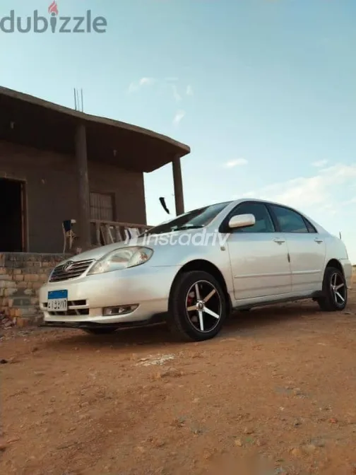 تويوتا كورولا 2002 أبيض مستعملة للبيع - 1