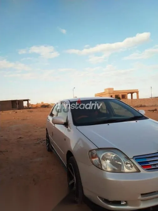 تويوتا كورولا 2002 أبيض مستعملة للبيع - 2