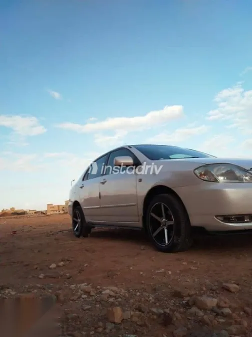 تويوتا كورولا 2002 أبيض مستعملة للبيع - 6