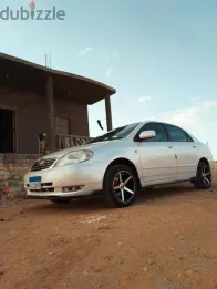 تويوتا كورولا 2002 أبيض مستعملة للبيع