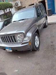 جيب شيروكي 2009 ذهبي مستعملة للبيع