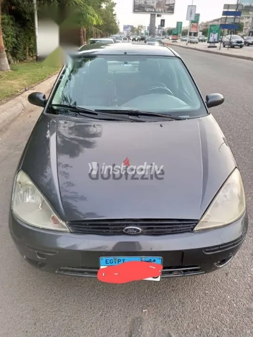 فورد فوكس 2003 فضي مستعملة للبيع - 3