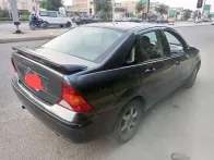 فورد فوكس 2003 فضي مستعملة للبيع