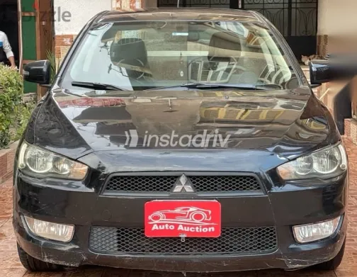 ميتسوبيشي لانسر 2015 أسود مستعملة للبيع - 1