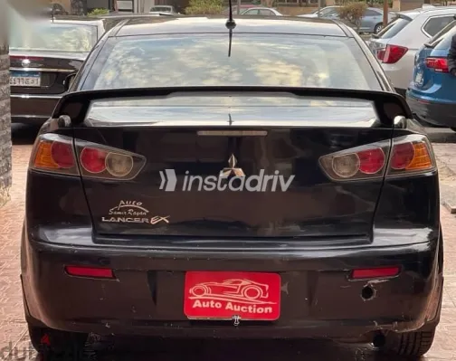 ميتسوبيشي لانسر 2015 أسود مستعملة للبيع - 4