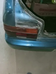 تويوتا كورولا 1995 أبيض مستعملة للبيع