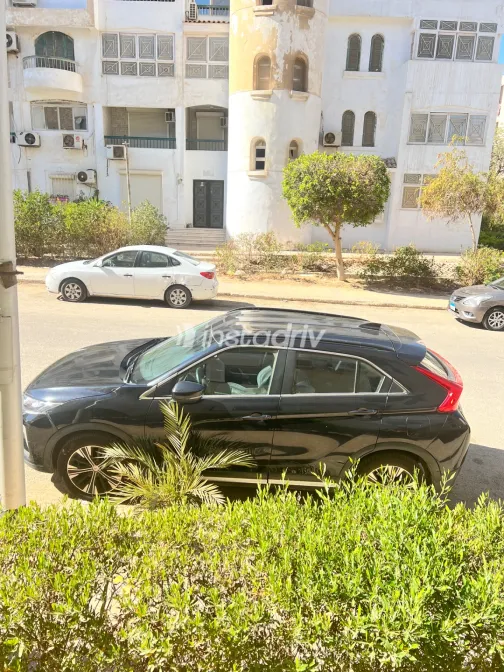 ميتسوبيشي اكليبس 2019 أبيض مستعملة للبيع - 8