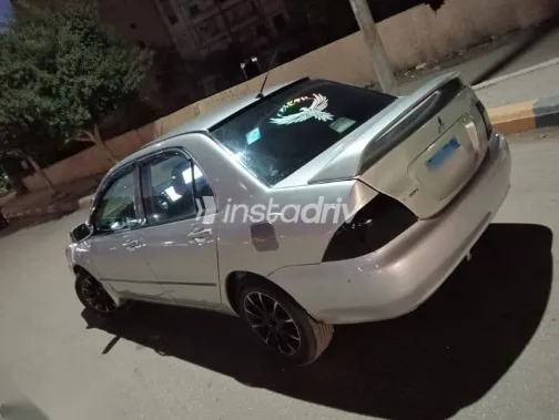 ميتسوبيشي لانسر 2009 فضي مستعملة للبيع - 2