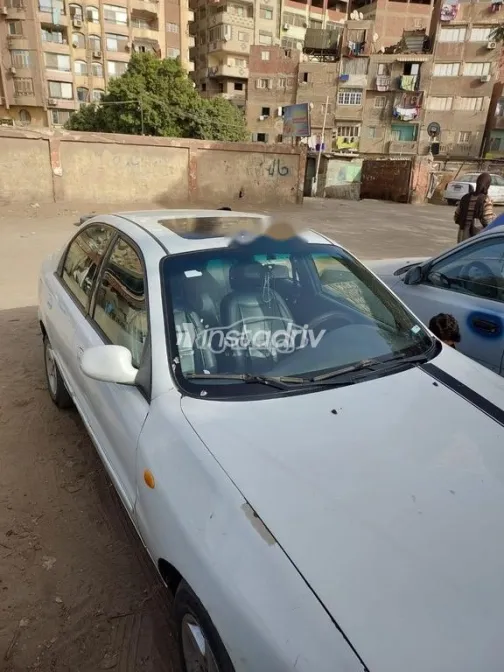 شيفروليه لانوس 2010 أبيض مستعملة للبيع - 1