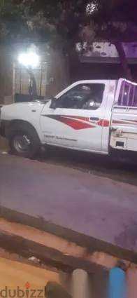 نيسان بيك اب 2015 أبيض مستعملة للبيع