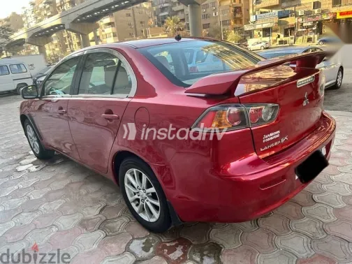 ميتسوبيشي لانسر 2016 أحمر مستعملة للبيع - 4