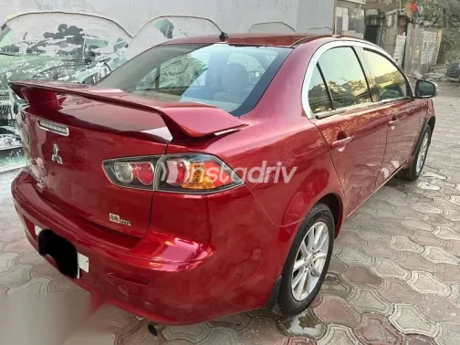 ميتسوبيشي لانسر 2016 أحمر مستعملة للبيع - 6