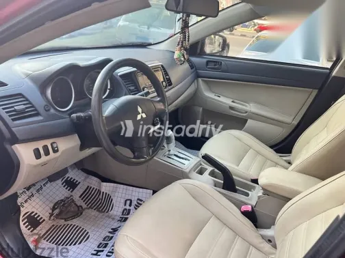 ميتسوبيشي لانسر 2016 أحمر مستعملة للبيع - 8