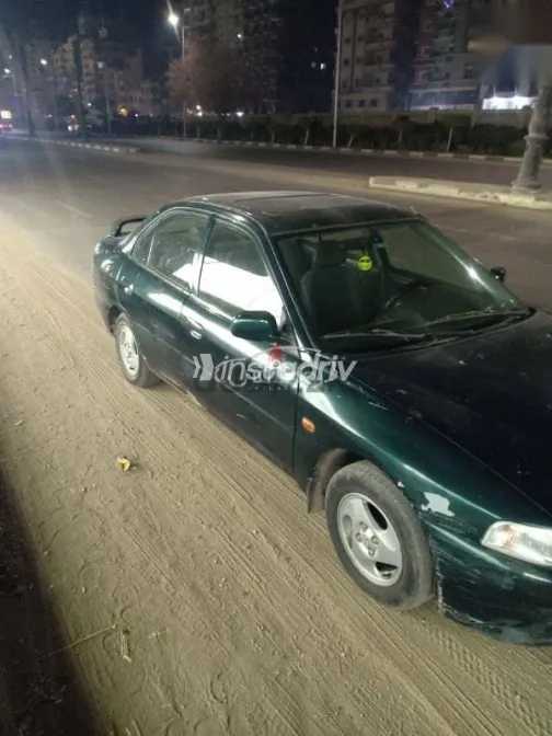 ميتسوبيشي لانسر 1997 أخضر مستعملة للبيع - 2