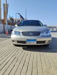 نيسان صنى 2009 ذهبي مستعملة للبيع