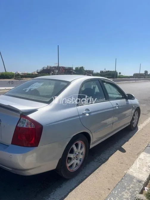 كيا سيراتو 2004 فضي مستعملة للبيع - 2