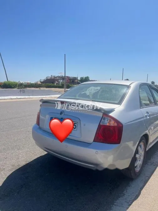 كيا سيراتو 2004 فضي مستعملة للبيع - 4